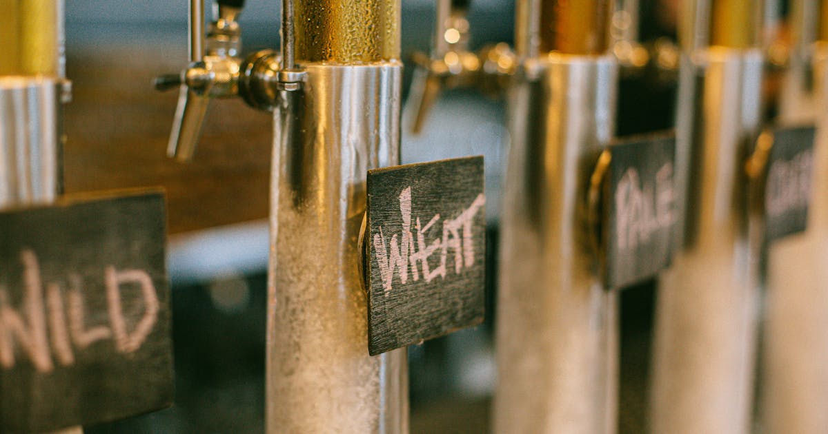 Brewing equipment and stainless steel fermentation tanks in a craft brewery
