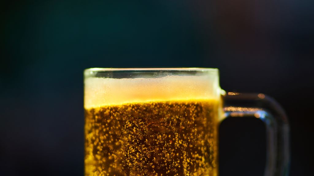 Different beer foam levels showing carbonation variation